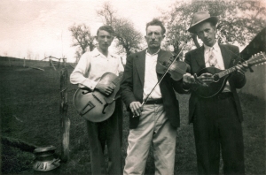 Fiddler Clay Reed and sons Howard (guitar) and Ray (mandolin). Laurel  Springs, North Carolina, 1949. (Collection: Marshall Wyatt)